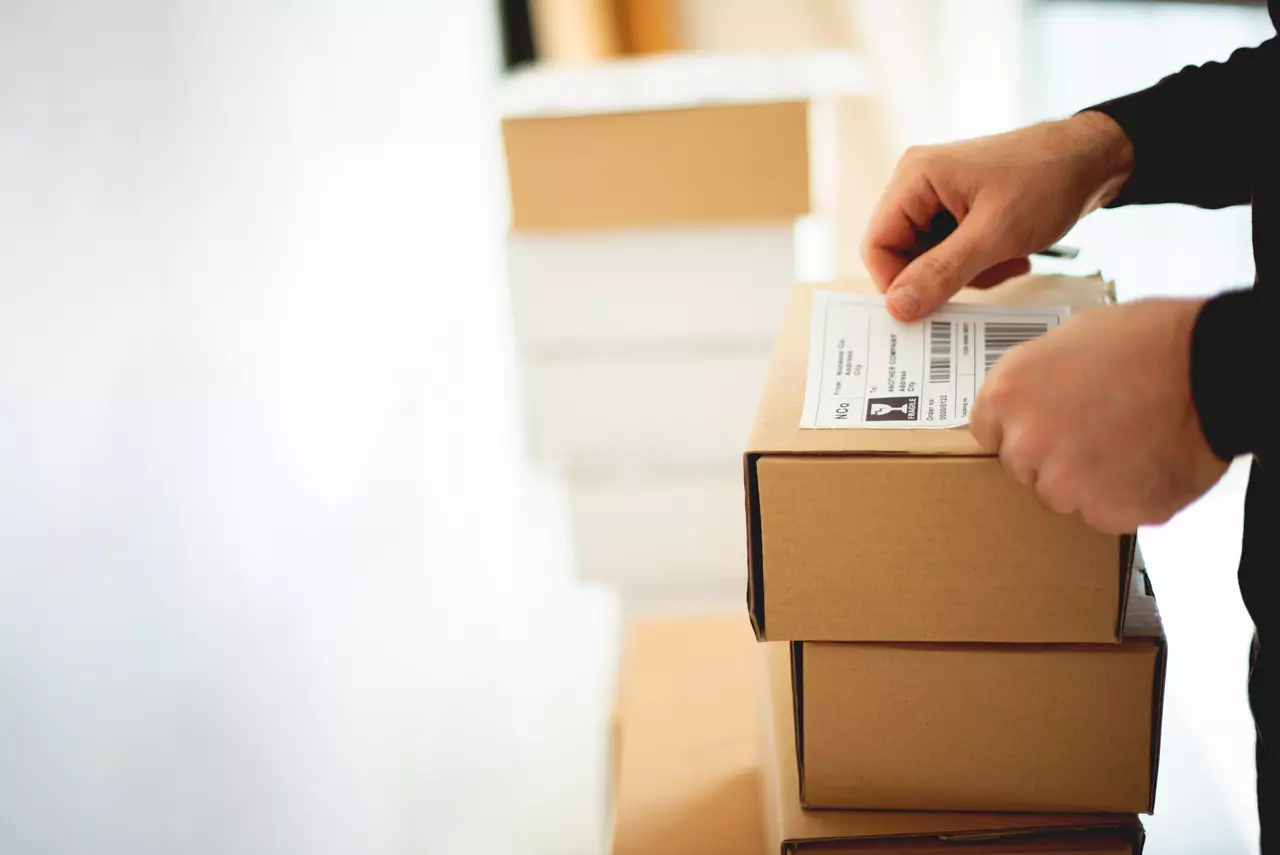 Delivery service, applying a shipping label for UV rentals