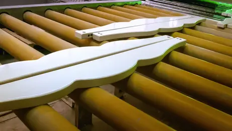 UV curing of wooden furniture parts